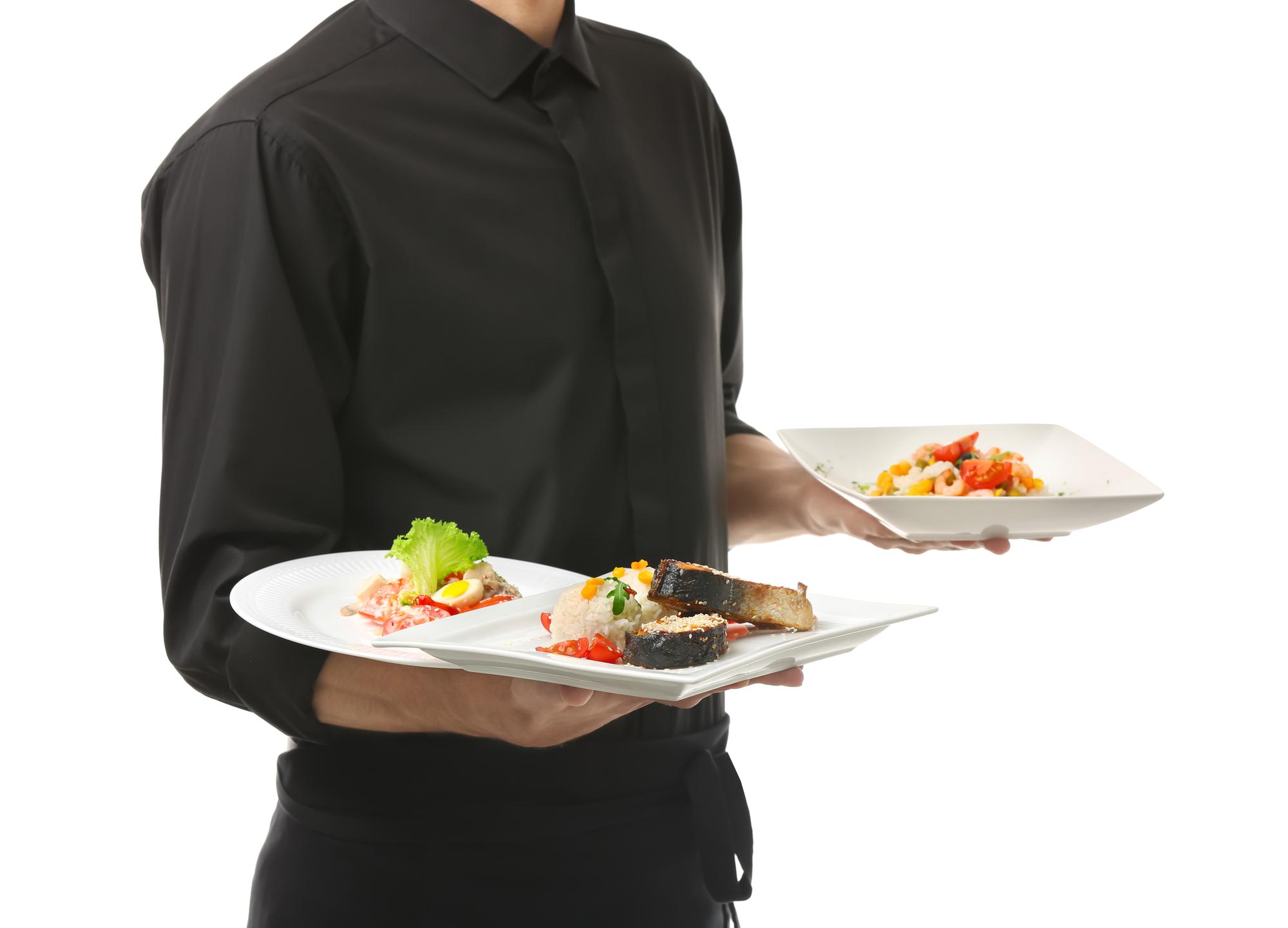 Caterer delivering plated meals