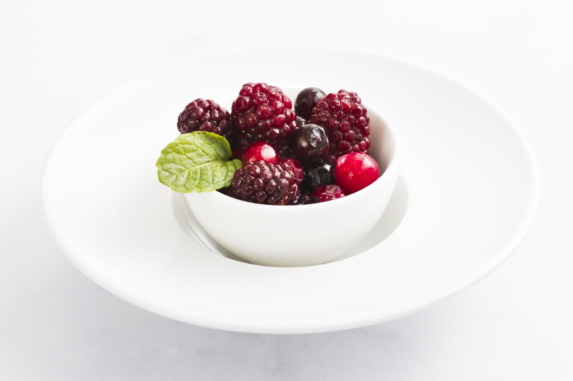 Minimal dessert with berry compote